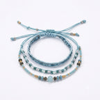 Blue braided three-piece bracelet set with adjustable pull cords | BRA567-01 | image 1