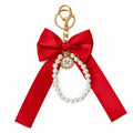 Red bow keychain with faux pearl strand | KCA051-02 | image 1