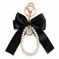 Black bow keychain with faux pearl strand | KCA051-04 | image 1