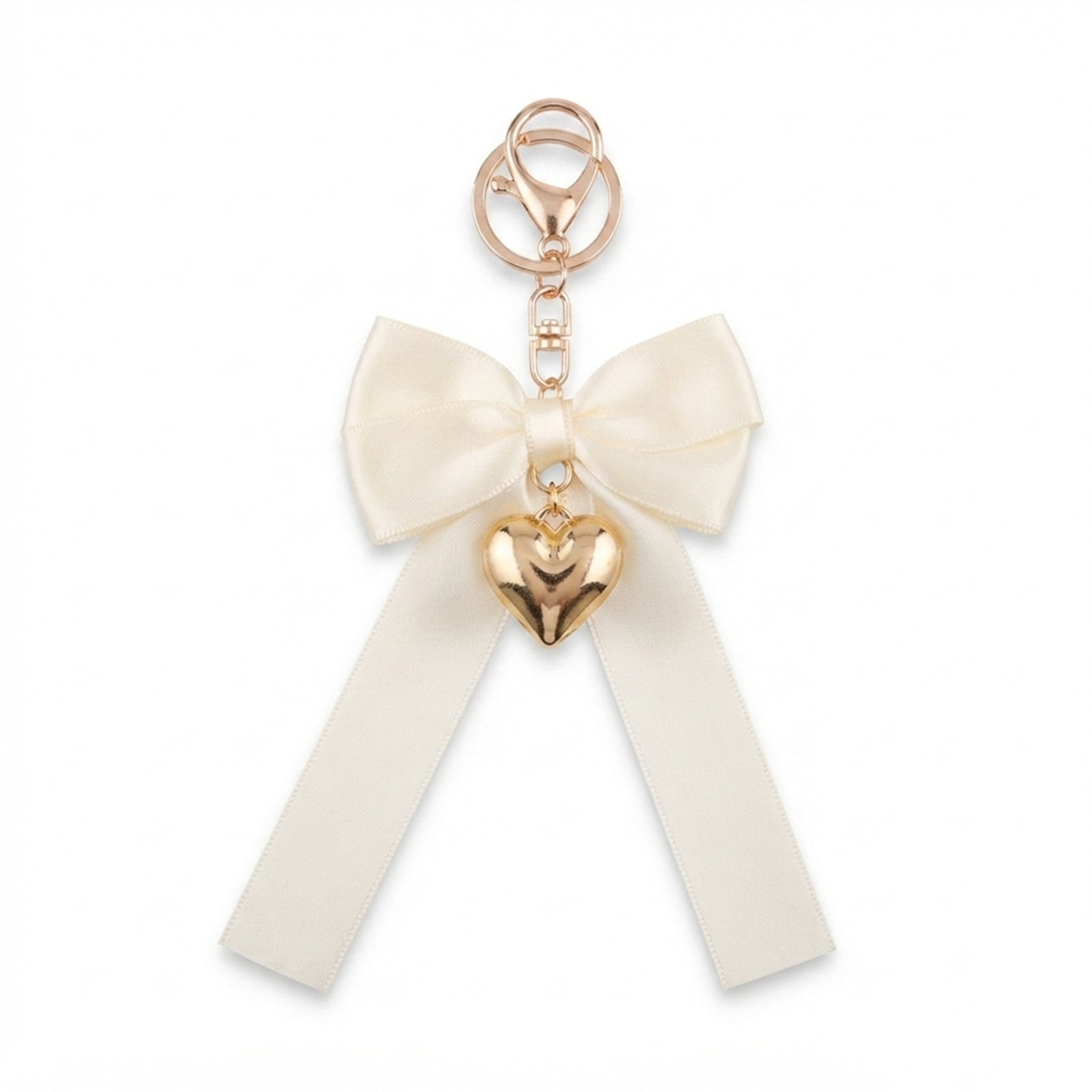 Ivory bow keychain with heart-shaped accent | KCA051-10 | image 1