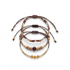 Brown braided three-piece bracelet set with adjustable pull cords | BRA516-01 | image 1