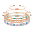 Beige braided three-piece bracelet set with adjustable pull cords | BRA586-01 | image 1