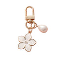 White cherry blossom keychain with pearl details | KCA070-04 | image 1