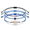 Navy braided three-piece bracelet set with adjustable pull cords | BRA577-01 | image 1