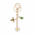 Gold-tone bee daisy leaf keychain accessory | KCA092-03 | image 1