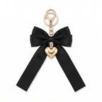 Black bow keychain with heart-shaped accent | KCA051-09 | image 1