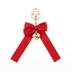 Red bow keychain with heart-shaped accent | KCA051-07 | image 1