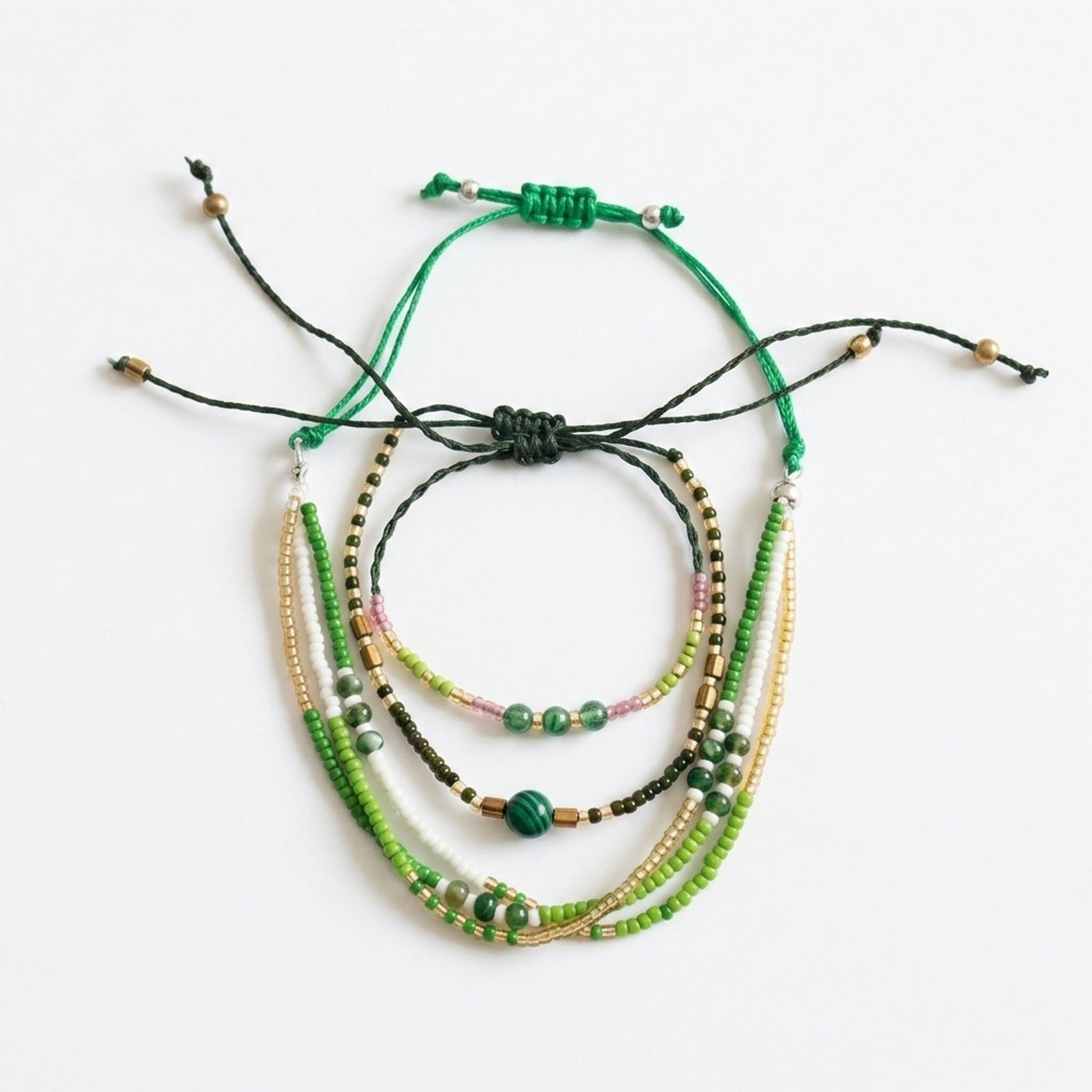 Green braided three-piece bracelet set with adjustable pull cords | BRA588-01 | image 1