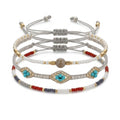 Gray braided three-piece bracelet set with adjustable pull cords | BRA568-01 | image 1