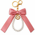Pink bow keychain with faux pearl strand | KCA051-01 | image 1
