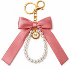 Pink bow keychain with faux pearl strand | KCA051-01 | image 1