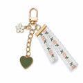 Green daisy keychain with lace detail | KCA066-01 | image 1