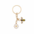 Gold-tone bee and daisy keychain accessory | KCA092-02 | image 1
