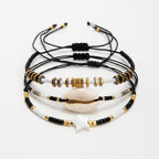 Black braided three-piece bracelet set with adjustable pull cords | BRA584-01 | image 1
