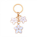 White cherry blossom keychain with floral accents | KCA070-01 | image 1