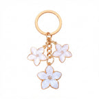 White cherry blossom keychain with floral accents | KCA070-01 | image 1