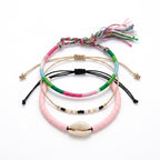 Pink braided three-piece bracelet set with adjustable pull cords | BRA564-01 | image 1