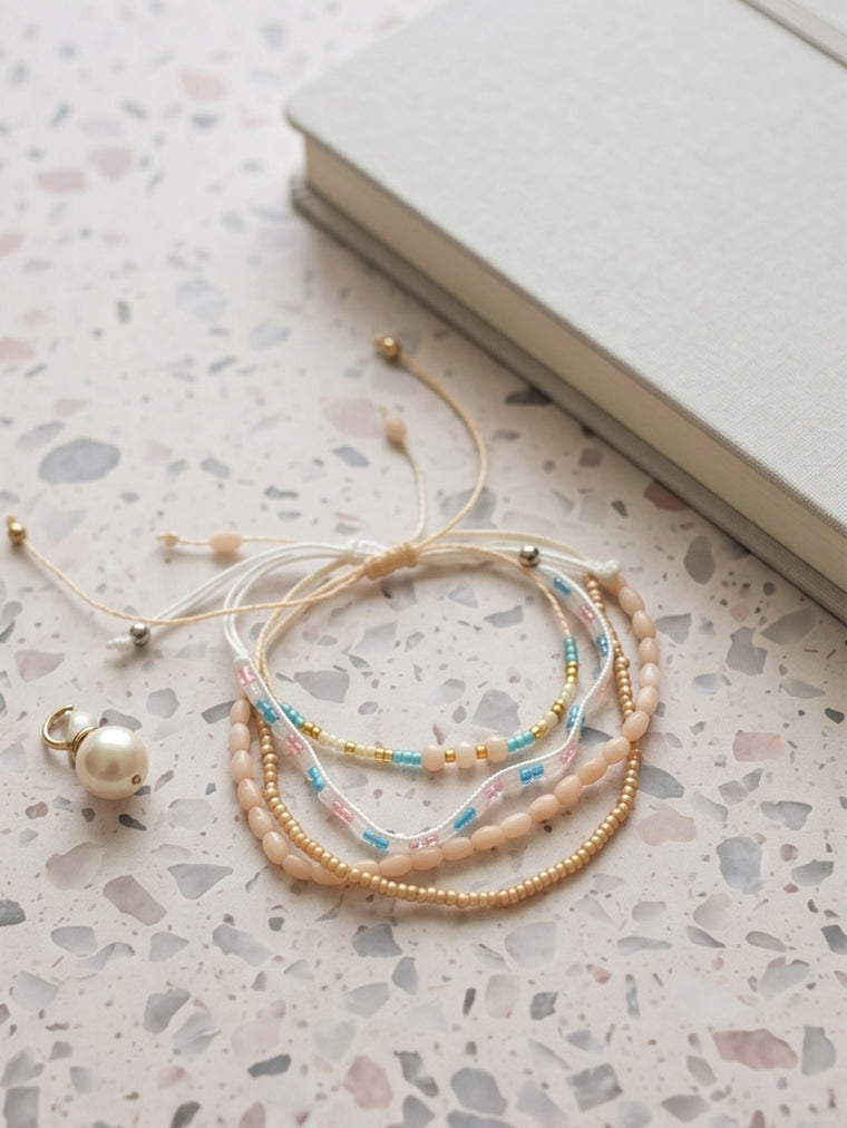 Beige braided three-piece bracelet set with adjustable pull cords | BRA586-01 | image 3