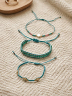Teal braided three-piece bracelet set with adjustable pull cords | BRA506-01 | image 3