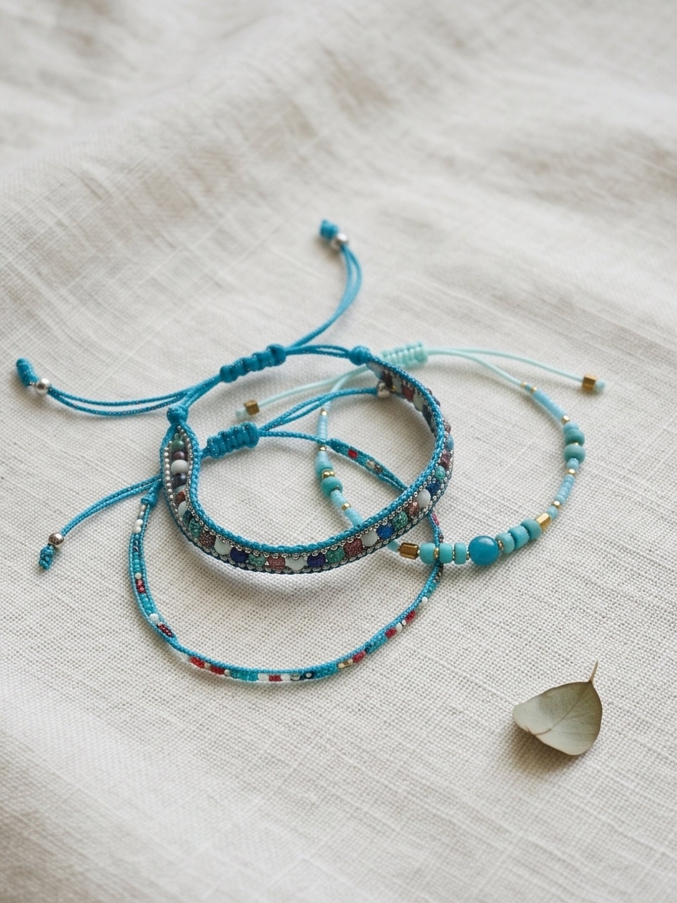 Blue braided three-piece bracelet set with adjustable pull cords | BRA576-01 | image 3