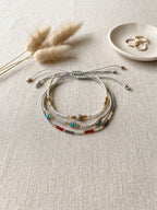 Gray braided three-piece bracelet set with adjustable pull cords | BRA568-01 | image 3
