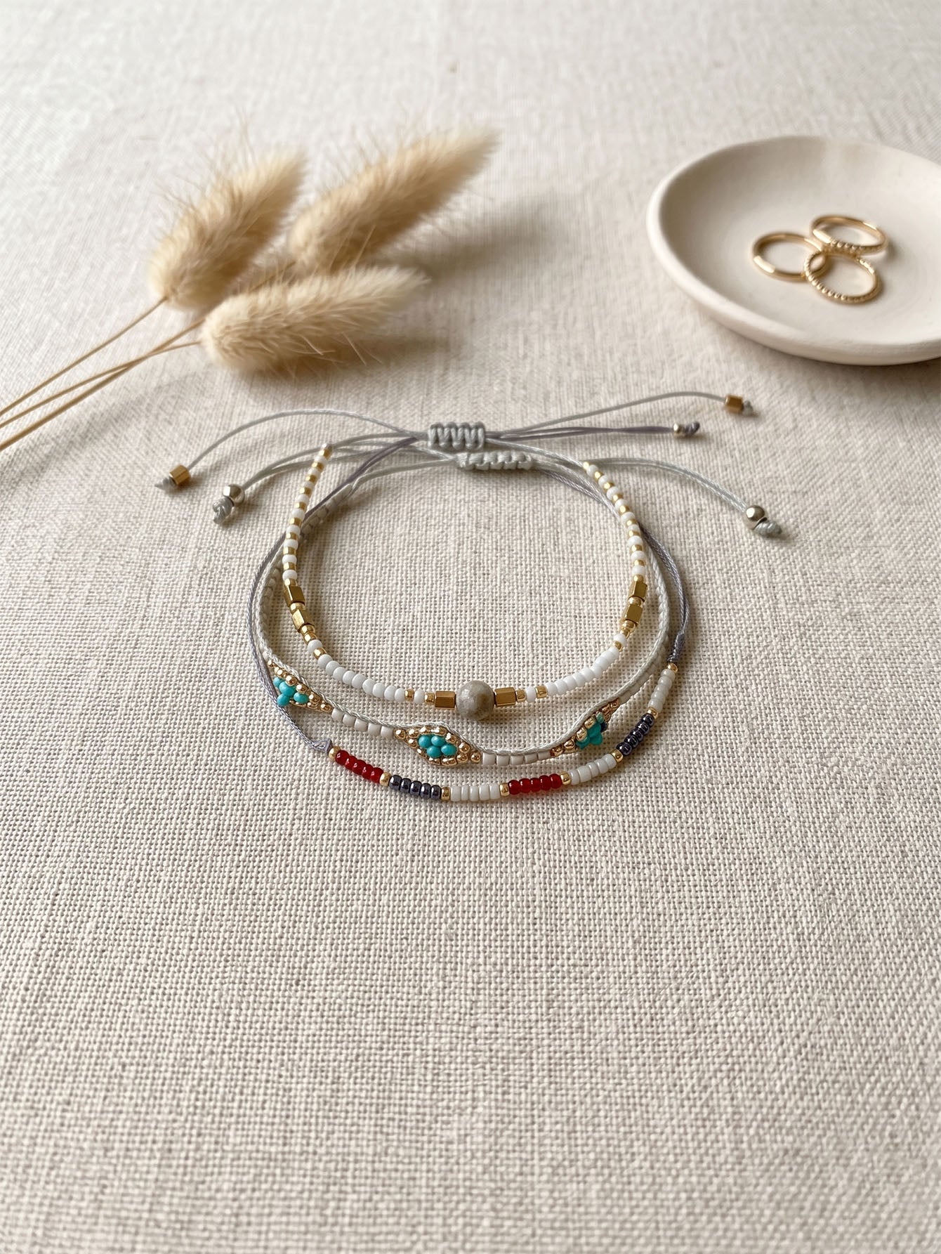 Gray braided three-piece bracelet set with adjustable pull cords | BRA568-01 | image 3
