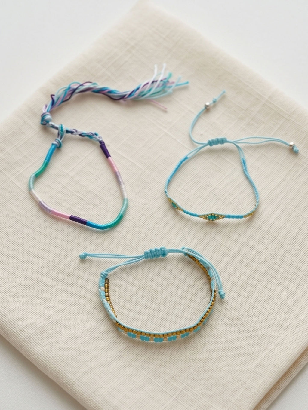 Blue braided three-piece bracelet set with adjustable pull cords | BRA574-01 | image 3