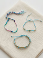 Blue braided three-piece bracelet set with adjustable pull cords | BRA574-01 | image 3