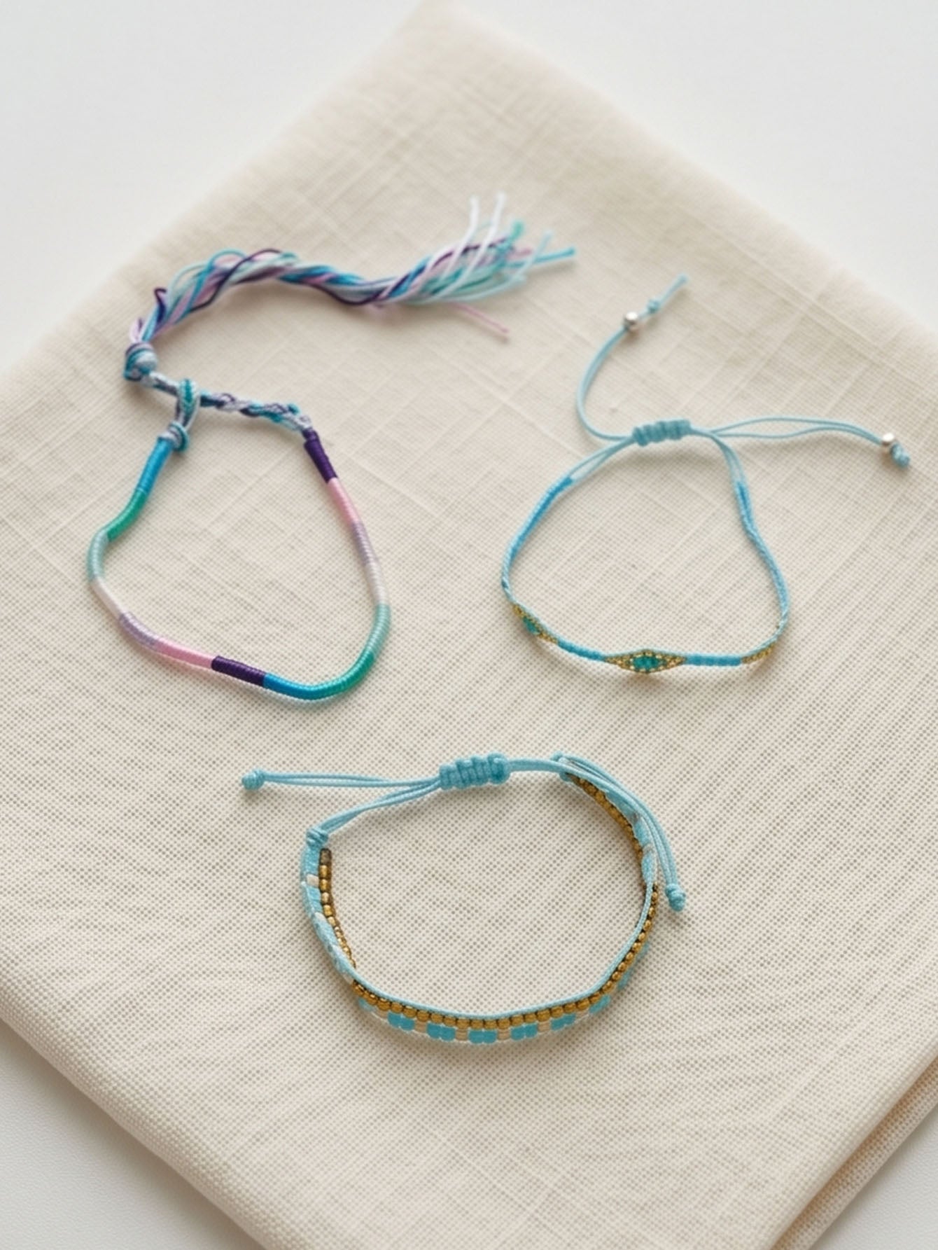 Blue braided three-piece bracelet set with adjustable pull cords | BRA574-01 | image 3