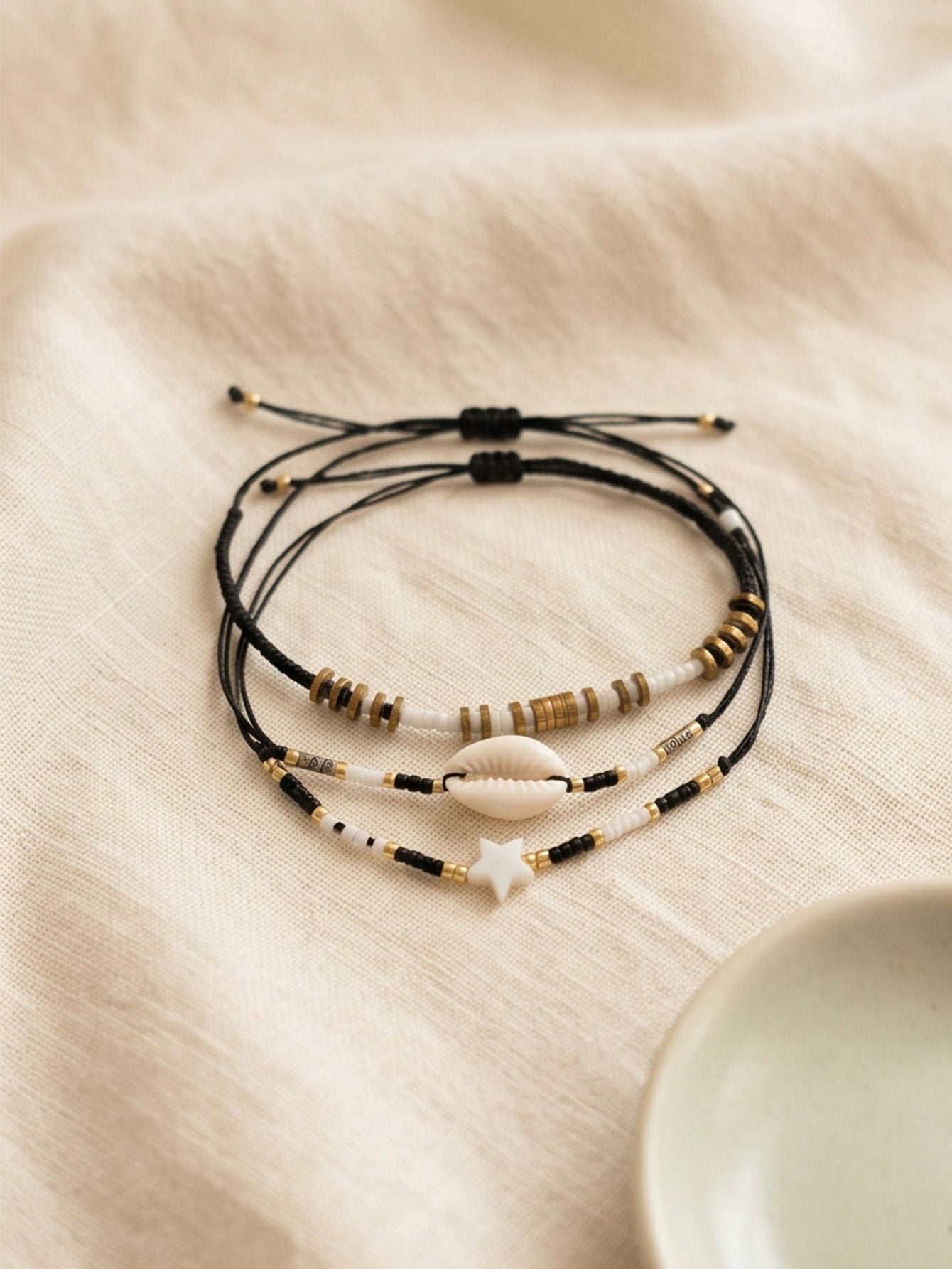 Black braided three-piece bracelet set with adjustable pull cords | BRA584-01 | image 3