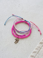 Fuchsia braided three-piece bracelet set with adjustable pull cords | BRA562-01 | image 3