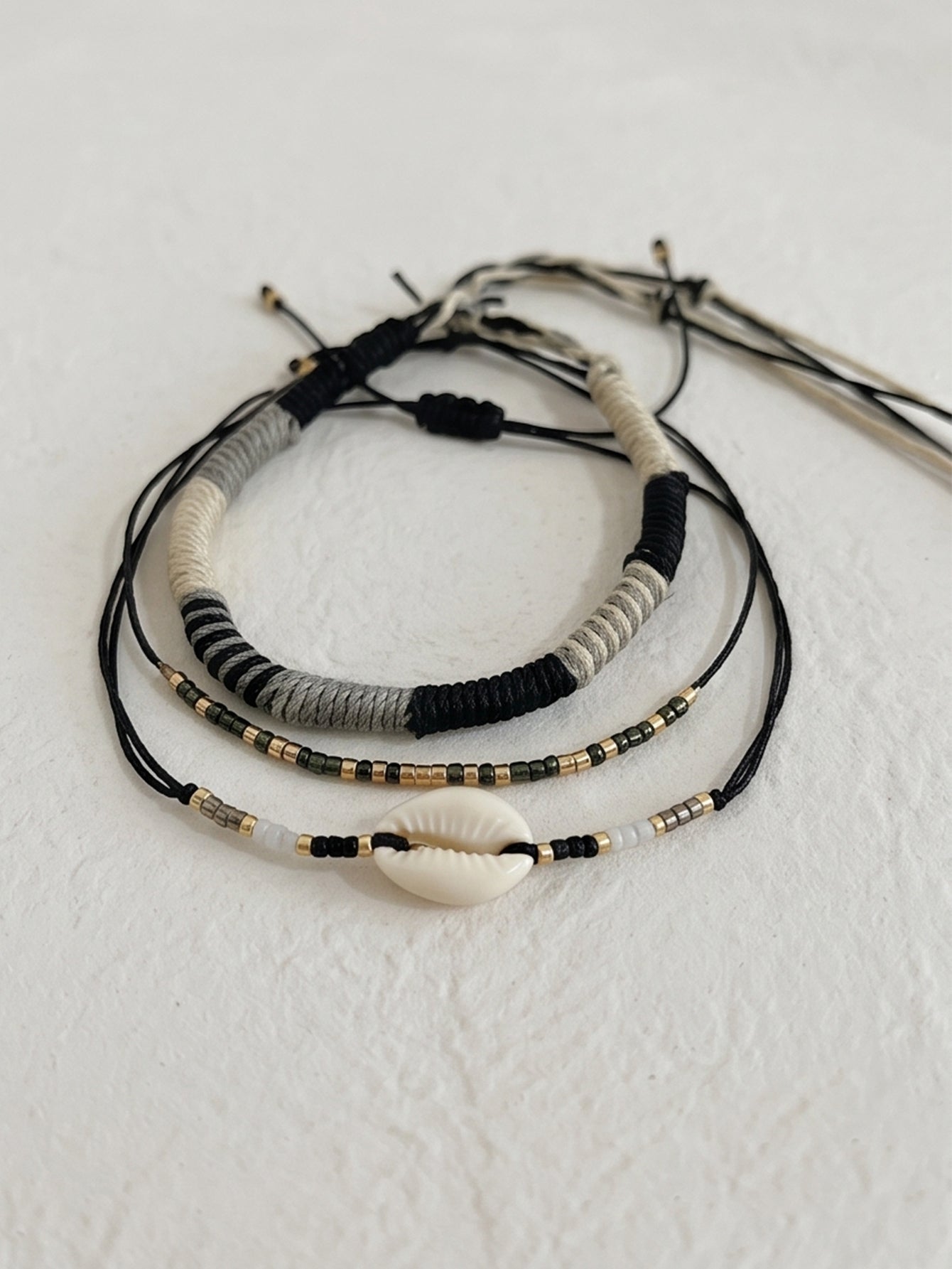Black braided three-piece bracelet set with adjustable pull cords | BRA570-01 | image 3