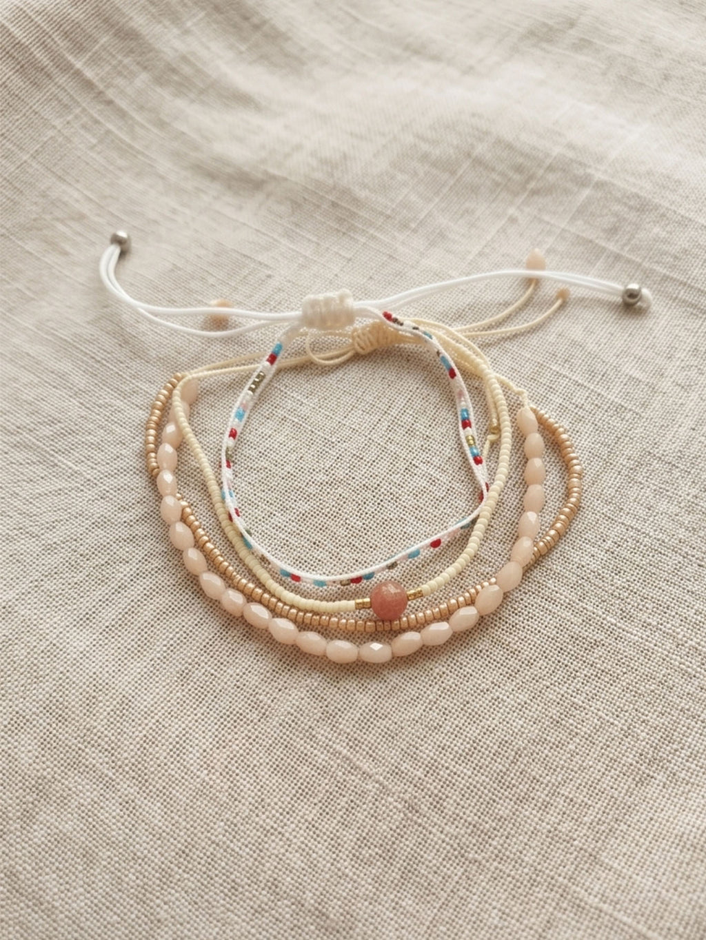 Beige braided three-piece bracelet set with adjustable pull cords | BRA558-01 | image 3