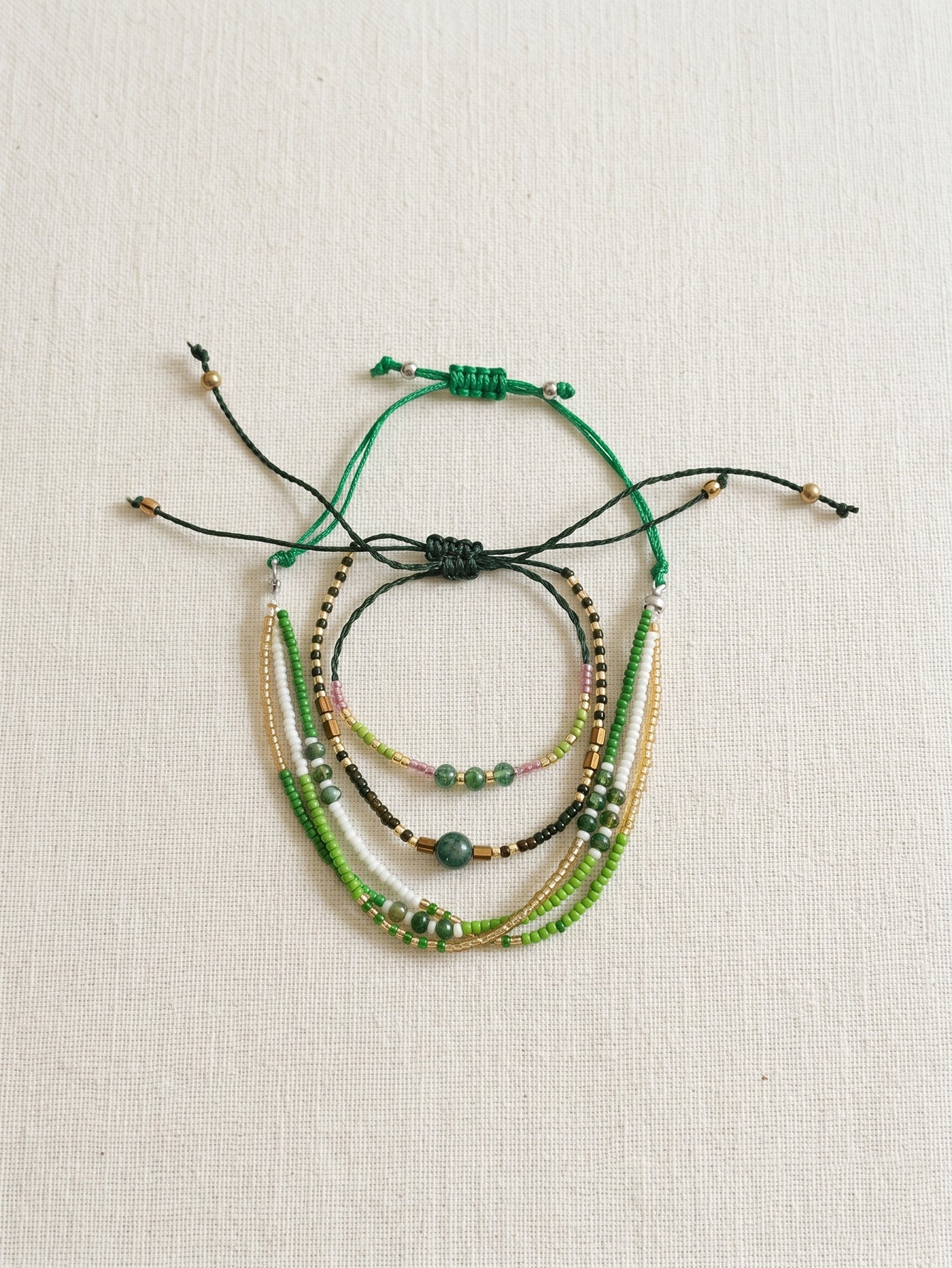 Green braided three-piece bracelet set with adjustable pull cords | BRA588-01 | image 3