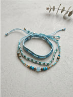 Blue braided three-piece bracelet set with adjustable pull cords | BRA567-01 | image 3