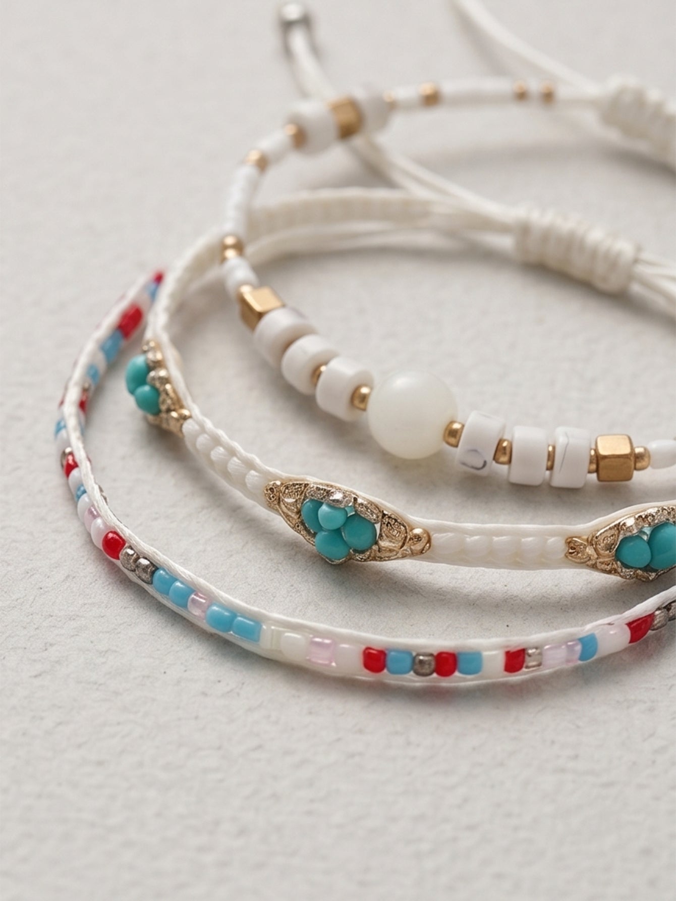 White braided three-piece bracelet set with adjustable pull cords | BRA518-01 | image 3
