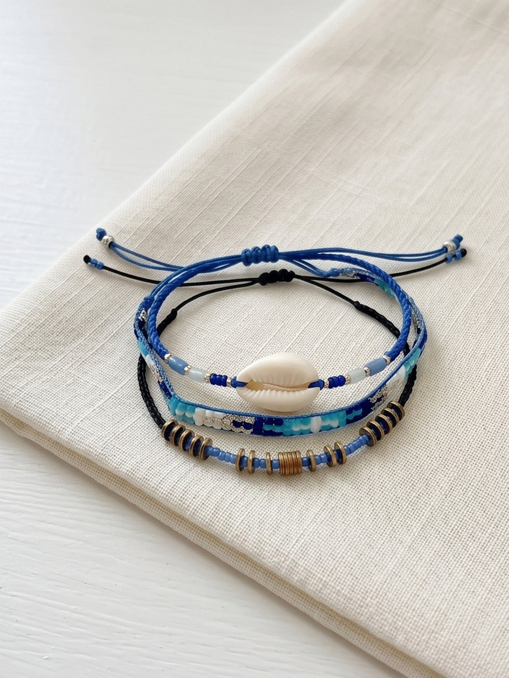 Blue braided three-piece bracelet set with adjustable pull cords | BRA504-01 | image 3