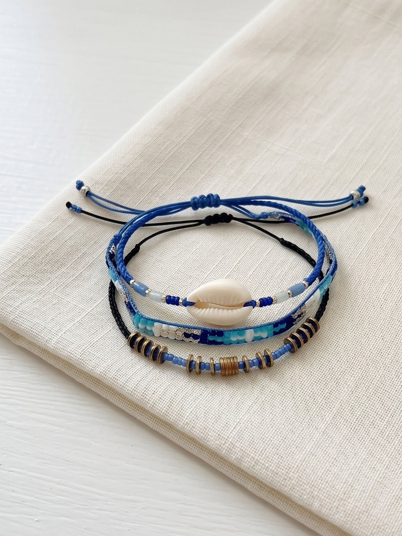 Blue braided three-piece bracelet set with adjustable pull cords | BRA504-01 | image 3