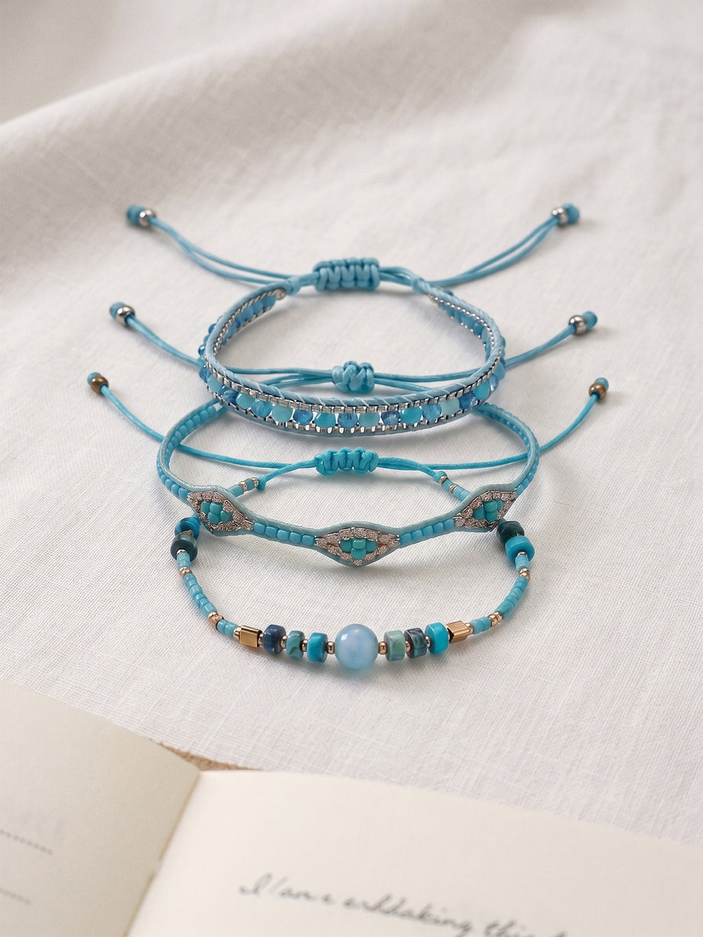 Teal braided three-piece bracelet set with adjustable pull cords | BRA517-01 | image 3