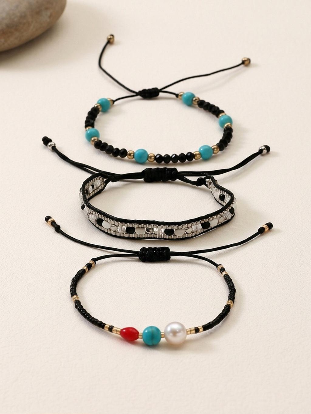 Black braided three-piece bracelet set with adjustable pull cords | BRA510-01 | image 3