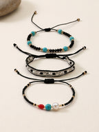 Black braided three-piece bracelet set with adjustable pull cords | BRA510-01 | image 3