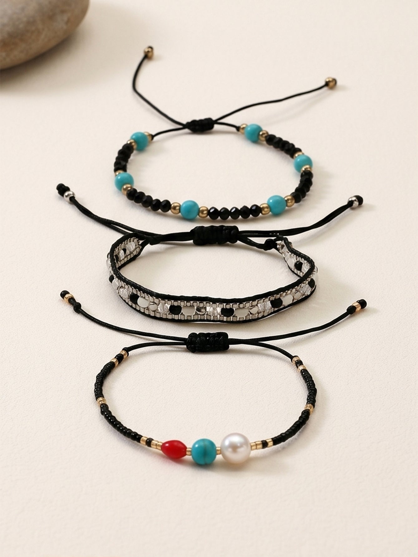 Black braided three-piece bracelet set with adjustable pull cords | BRA510-01 | image 3