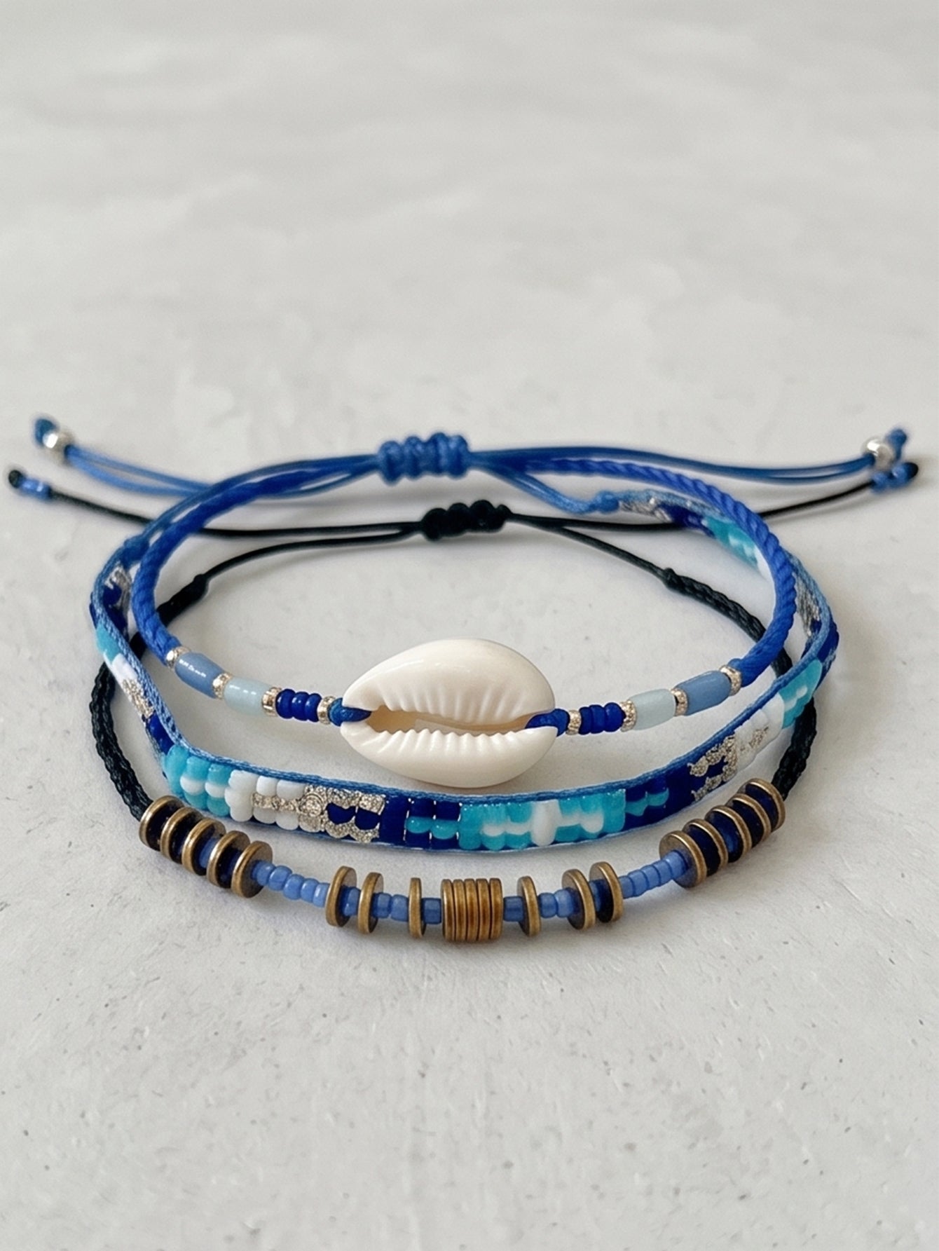 Blue braided three-piece bracelet set with adjustable pull cords | BRA504-01 | image 4