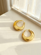 Gold-tone stainless steel U-hoop earrings with polished finish | ERA646-01 | image 4