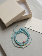 Blue braided three-piece bracelet set with adjustable pull cords | BRA582-01 | image 4