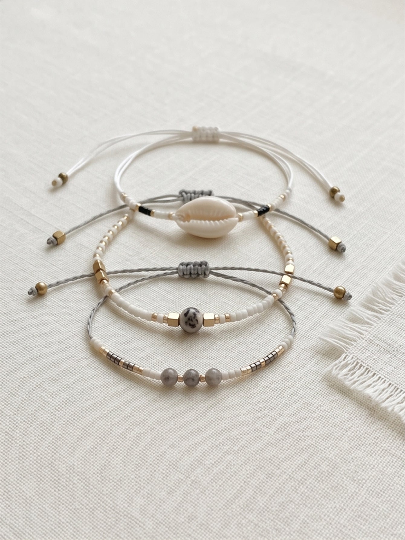White braided three-piece bracelet set with adjustable pull cords | BRA519-01 | image 4