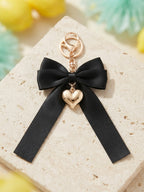 Black bow keychain with heart-shaped accent | KCA051-09 | image 4
