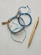 Blue braided three-piece bracelet set with adjustable pull cords | BRA572-01 | image 4