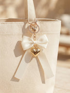 Ivory bow keychain with heart-shaped accent | KCA051-10 | image 4