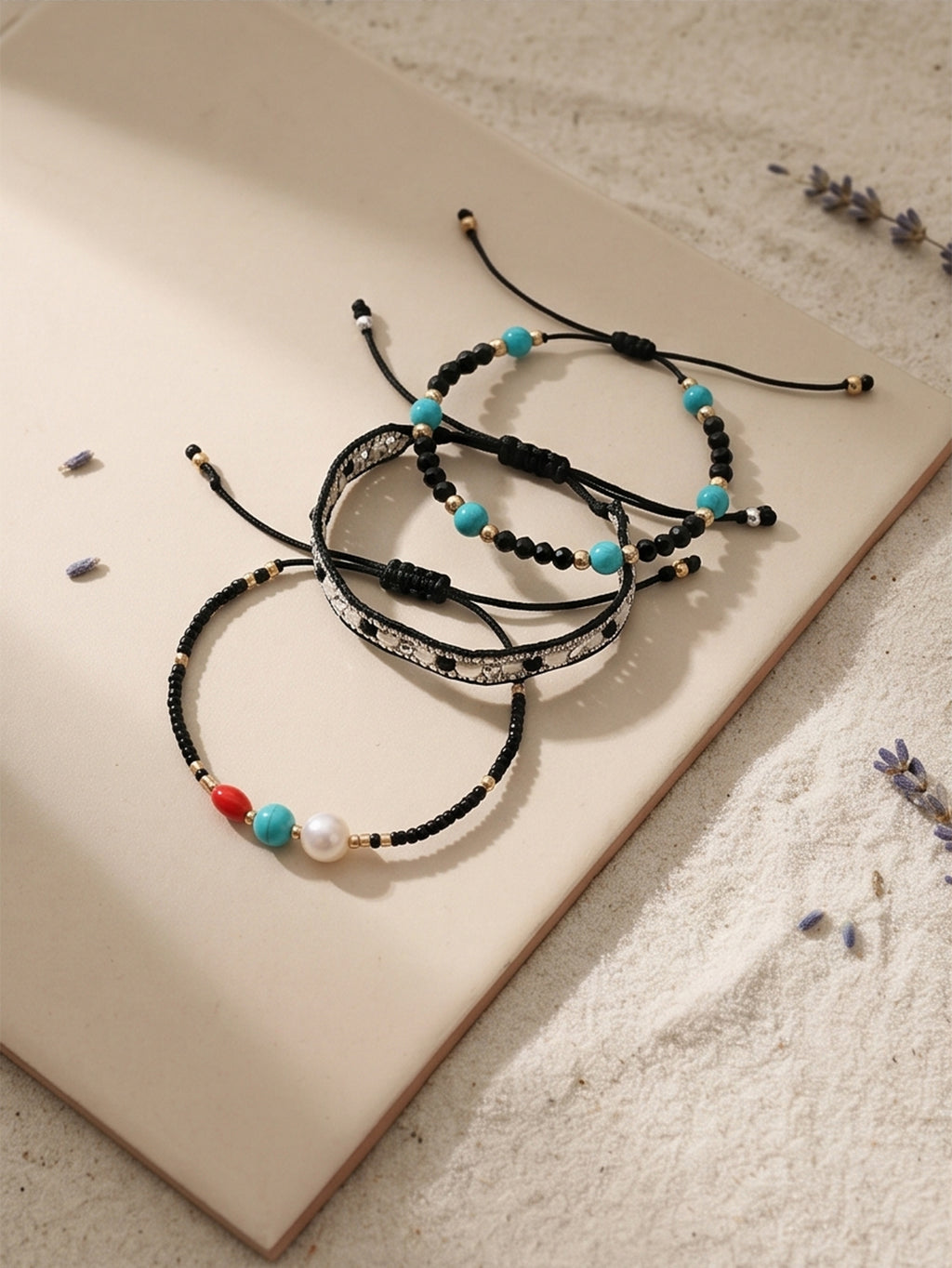 Black braided three-piece bracelet set with adjustable pull cords | BRA510-01 | image 4